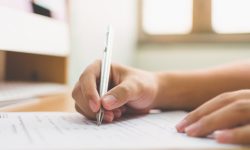 Businessman hand signing the document business contract agreement